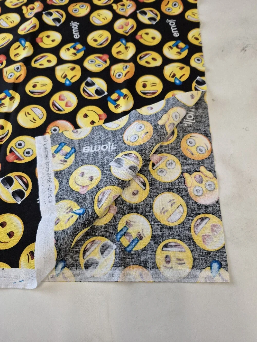 Emoji Faces Fabric by David Textiles Inc 19x42” Black